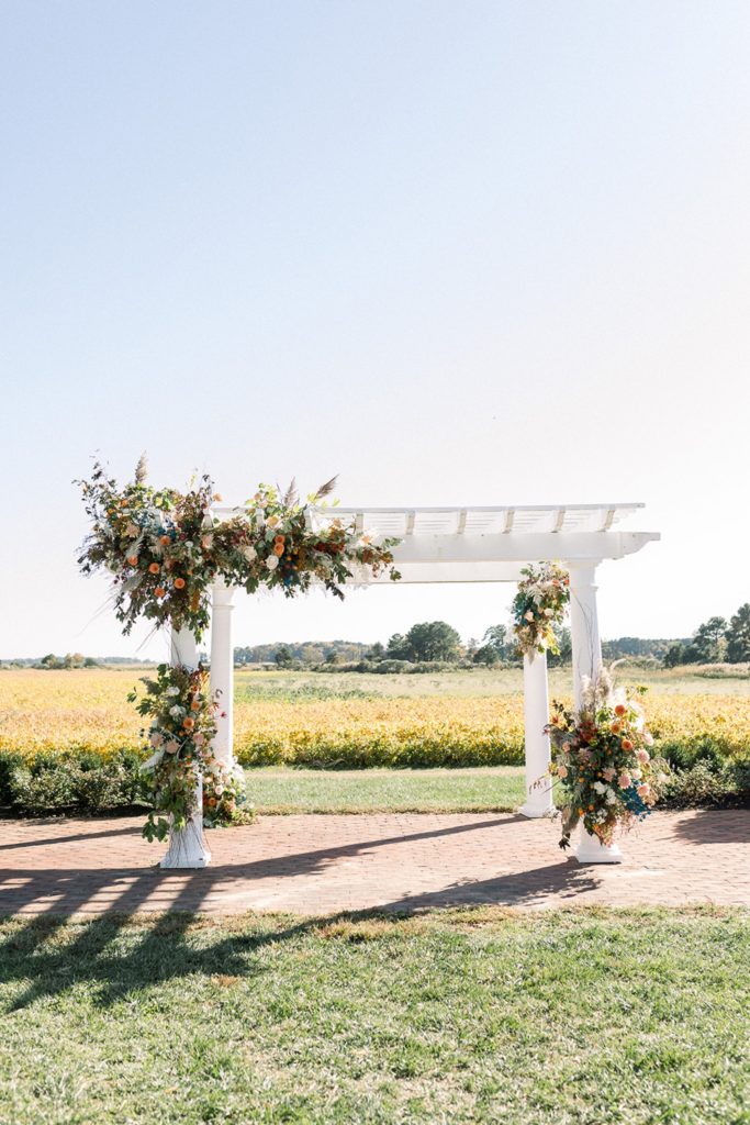 fall ceremony arch florals